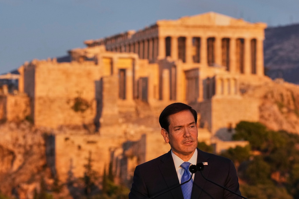 U.S. Secretary of State Marco Rubio speaks at the Pnyx hill, where ancient Athenians held democratic assemblies, with the ancient Parthenon temple atop the Acropolis in the background, in Athens,Wednesday, Oct. 7, 2026. (AP Photo/Mark Schiefelbein, Pool)