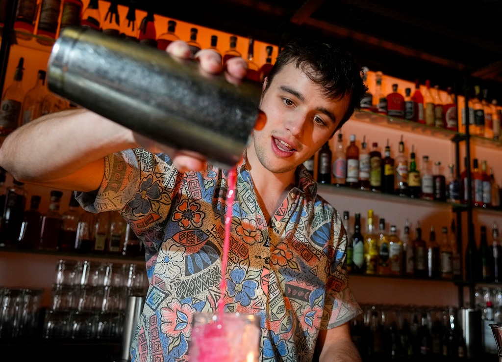 (Bethany Baker  |  The Salt Lake Tribune) Eric Lewis pours a craft mocktail drink at Bar X in Salt Lake City on Thursday, Jan. 11, 2024.