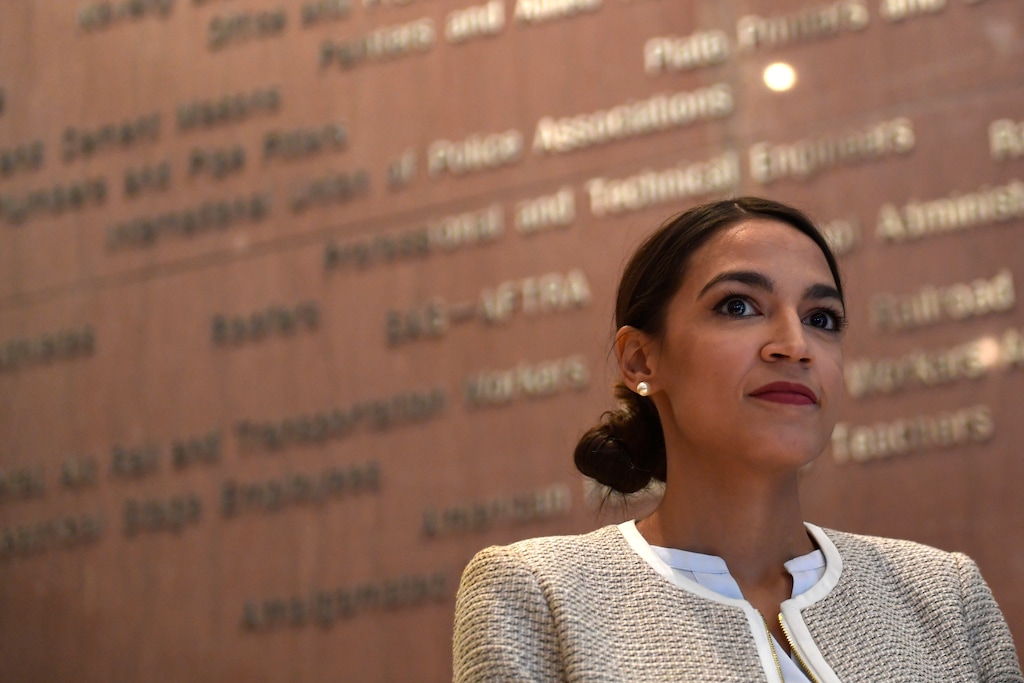 Rep.-elect Alexandria Ocasio-Cortez, D-N.Y., listens during a news conference with members of the Progressive Caucus in Washington, Monday, Nov. 12, 2018. (AP Photo/Susan Walsh)