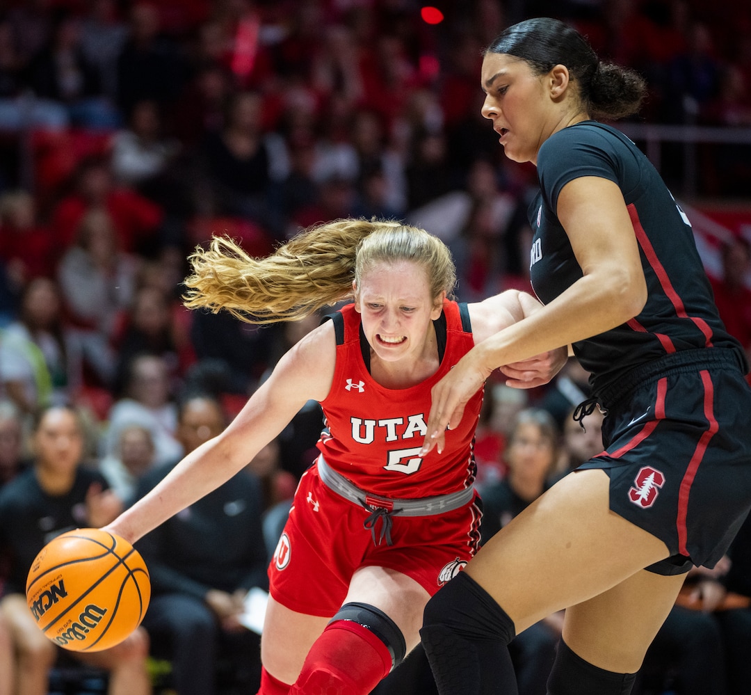 (Rick Egan | The Salt Lake Tribune) Utah Utes guard Gianna Kneepkens (5) gets past Stanford Cardinal center Lauren Betts (51), in PAC-12 action, at the Jon M. Huntsman Center, on Saturday, Feb. 25, 2023.