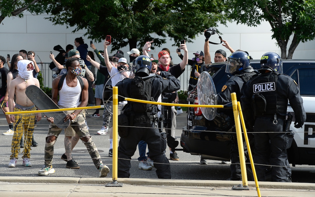 (Francisco Kjolseth  |  The Salt Lake Tribune) Police and protesters stand off in Salt Lake City on May 30, 2020.