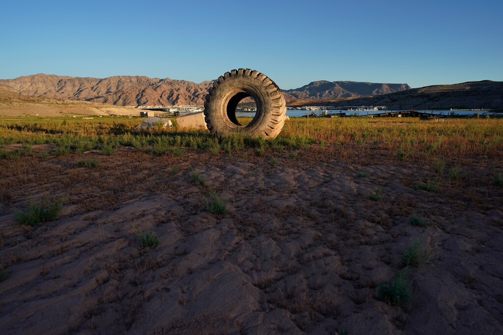 (AP Photo/John Locher)
A truck tire once in the water as part of a marina sits on dry ground as water levels have dropped near the Callville Bay Resort & Marina in the Lake Mead National Recreation Area, Tuesday, Aug. 30, 2022, near Boulder City, Nev.