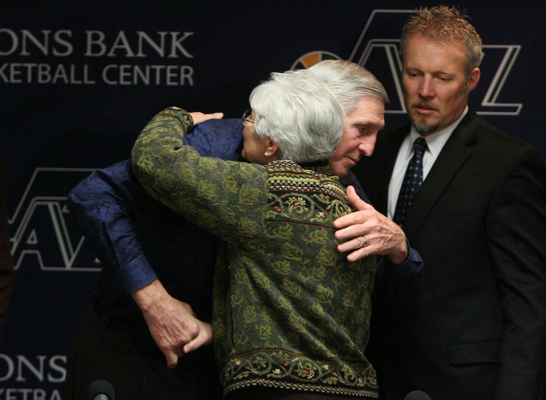 (Jeremy Harmon  |  Tribune file photo) Jerry Sloan hugs Jazz owner Gail Miller after announcing his resignation as head coach in 2011.