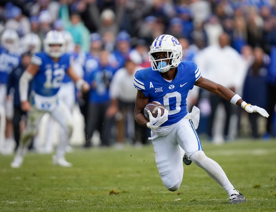 (Bethany Baker | The Salt Lake Tribune) Brigham Young Cougars wide receiver Kody Epps (0) runs the ball against the Oklahoma Sooners at LaVell Edwards Stadium in Provo on Saturday, Nov. 18, 2023.