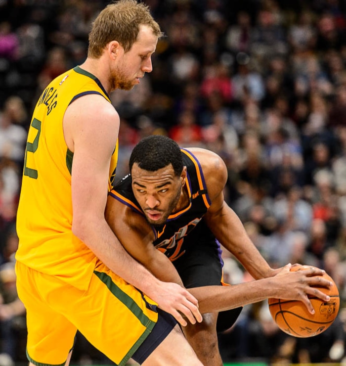 (Trent Nelson | The Salt Lake Tribune)  Utah Jazz forward Joe Ingles (2) defending Phoenix Suns forward TJ Warren (12) as the Utah Jazz host the Phoenix Suns, NBA basketball in Salt Lake City, Wednesday Feb. 14, 2018.