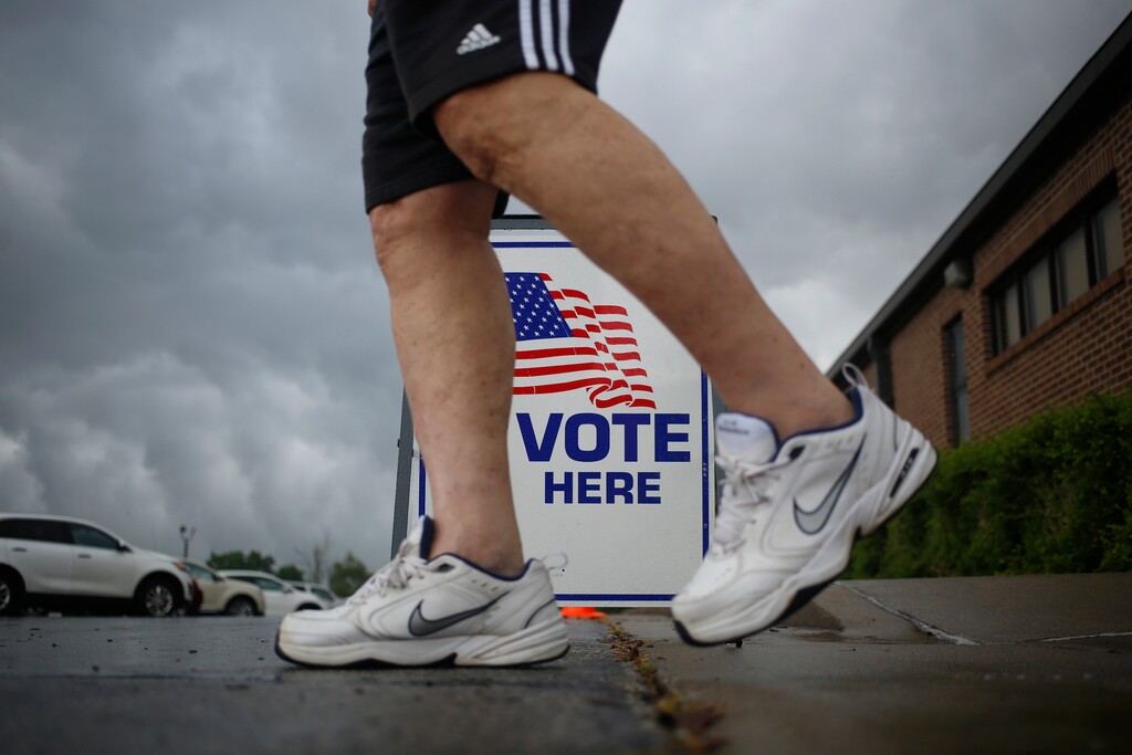 (Luke Sharrett | The New York Times)
A voter leaves a polling pace in Simpsonville, Ky., June 23, 2022. "One of our greatest errors as a country has been our nonstop campaign to convince generations of voters that elections are about freedom of choice," writes New York Times columnist Charles M. Blow.