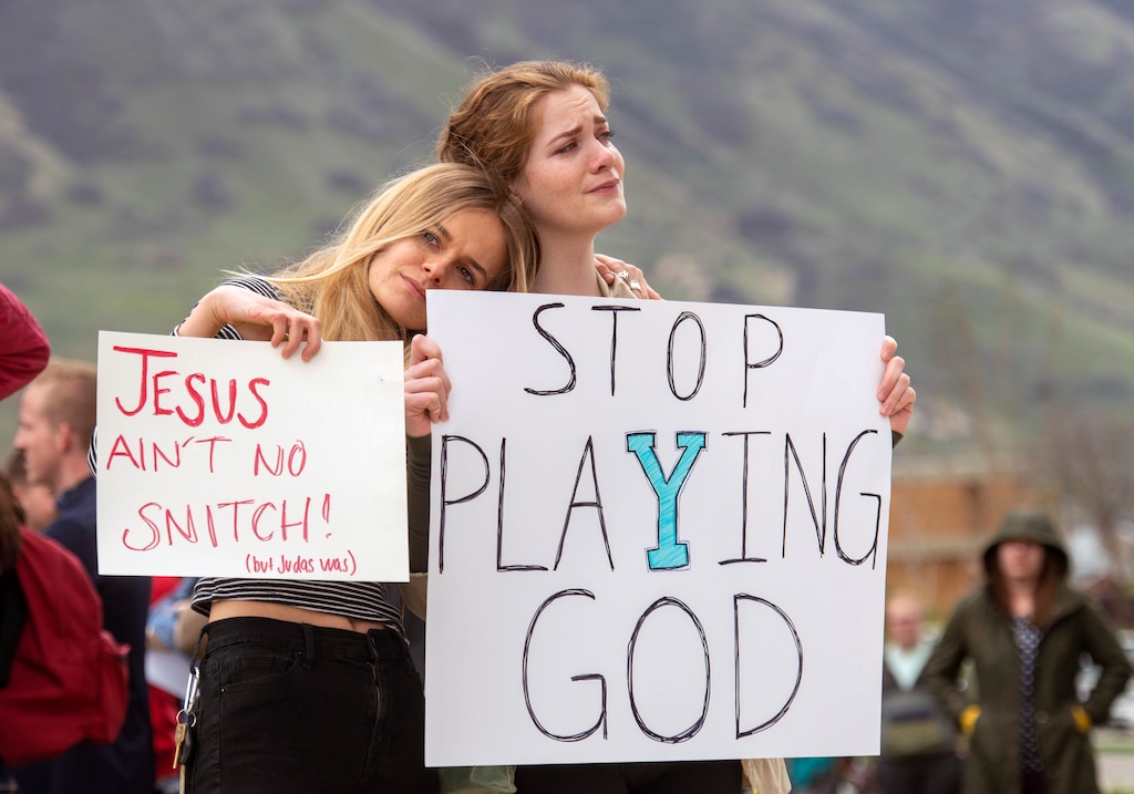 (Rick Egan | The Salt Lake Tribune) Tyler Slade and Zoe Calcote stand for a moment of silence, as the they gather on the campus of Brigham Young University, with hundreds of BYU students at a rally to oppose how the school's Honor Code Office investigates and disciplines students, Friday, April 12, 2019, in Provo, Utah. A strict set of rules at Mormon-owned Brigham Young University banning things commonplace at many campuses such as drinking, premarital sex, beards and piercings is under new scrutiny — this time from students who want their university to be more compassionate with the punishments for violators.