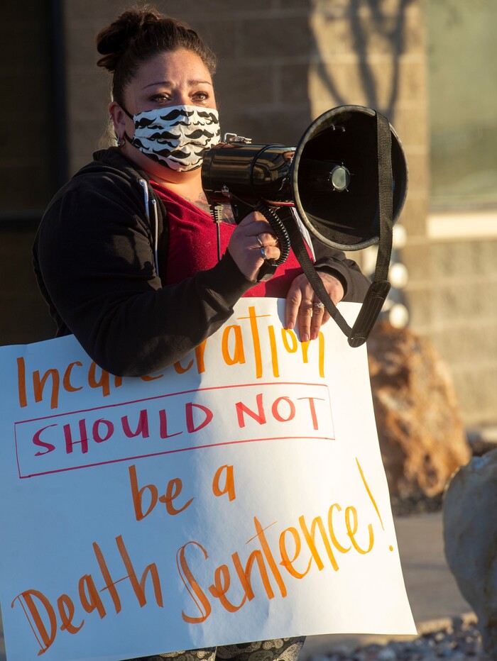 (Rick Egan  |  The Salt Lake Tribune)  Kate Kalt speaks at a rally for prison inmates, after a COVID-19 outbreak has spread at the Draper prison, at the Department of Corrections, on Tuesday, Oct. 13, 2020.