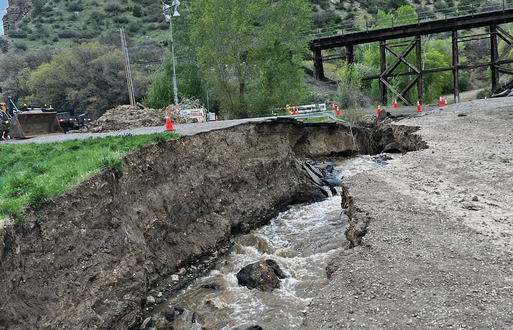 (Patti Kaech) Bear Creek, photographed on May 15, digs a big ditch across Highway 133.