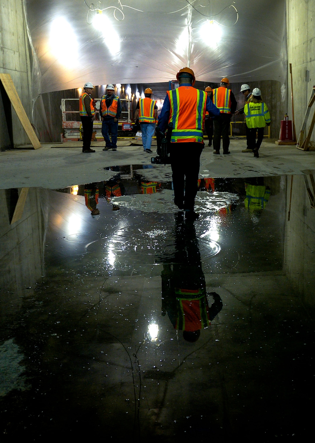 Leah Hogsten  |  The Salt Lake Tribune Salt Lake City International Airport redevelopment project managers lead members of the media on a tour of the airport expansion construction site, Monday, Oct. 22, 2018. The first phase construction of the $3.6 billion project is due to open in 700 days. Nearing completion is the new concourse for aircraft gates, an enclosed terminal, the steel skeleton of a new "gateway" building, a five-story parking garage and elevated roadways. 