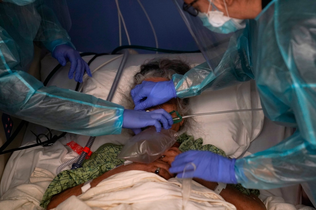(Jae C. Hong | AP photo)

Two nurses put a ventilator on a patient in a COVID-19 unit at St. Joseph Hospital in Orange, Calif., Thursday, Jan. 7, 2021.