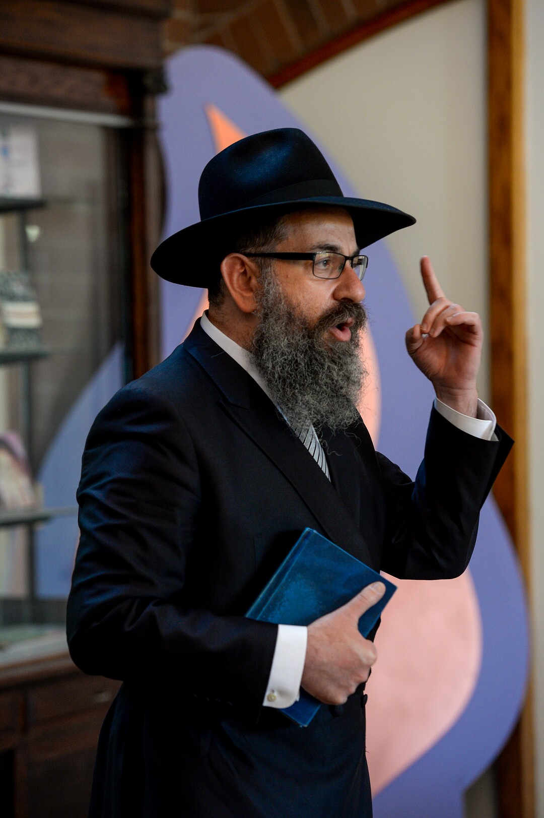 Leah Hogsten  |  The Salt Lake Tribune  Rabbi Benny Zippel addresses the congregants prior to the Shabbat candle lighting. Jewish women in Utah at the Chabad Lubavitch of Utah and the world over kindled Shabbat candles, May 3, 2019 in loving tribute to Lori Gilbert-Kaye and in prayer for peace and tolerance amongst all of humanity. Lori Kaye was killed during The Chabad of Poway synagogue shooting on the last day of Passover and three others were injured. Although the lighting of Shabbat Candles is uniquely tasked to the Jewish woman, the  community and those wishing to show their support were welcome to attend.