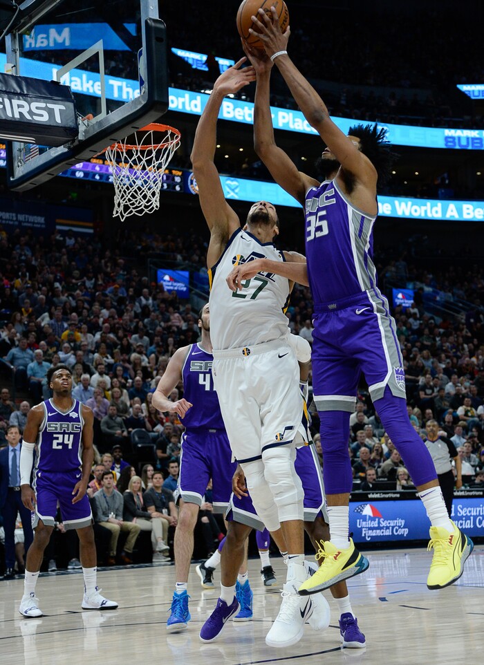 (Francisco Kjolseth  |  The Salt Lake Tribune)  Utah Jazz center Rudy Gobert (27) battles for a rebound as the Utah Jazz host the Sacramento Kings in their NBA game at Vivint Smart Home Arena Friday, April 5, 2019, in Salt Lake City.