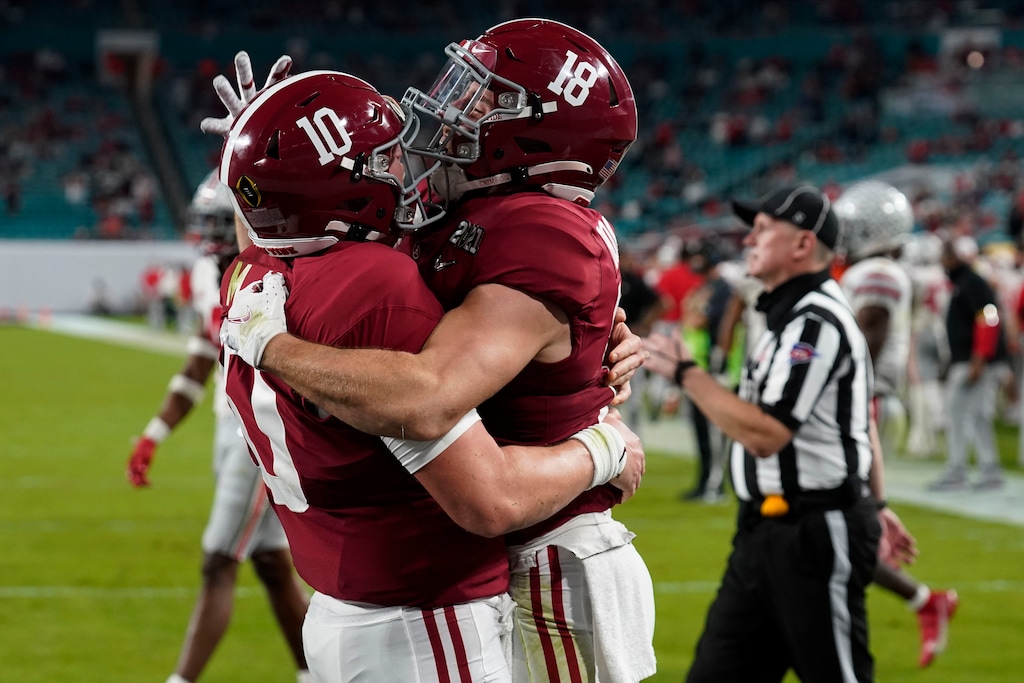 (Chris O'Meara | The Associated Press) Alabama wide receiver Slade Bolden, right, celebrates after scoring a touchdown with quarterback Mac Jones during the second half of an NCAA College Football Playoff national championship game against Ohio State, Monday, Jan. 11, 2021, in Miami Gardens, Fla.
