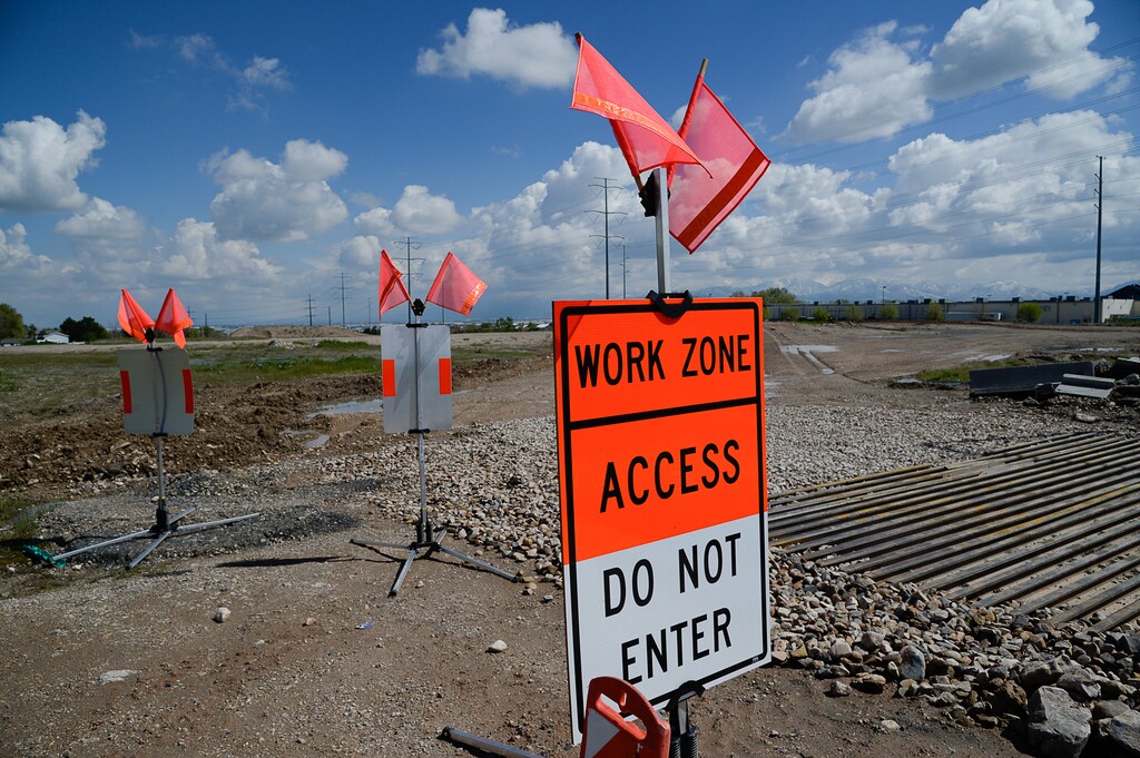 (Francisco Kjolseth | Tribune file photo)  Signs identify the last stage of the Mountain View Corridor at 4100 South which will soon be extended to S.R. 201.