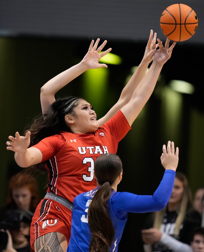(Francisco Kjolseth | The Salt Lake Tribune) Utah Utes forward Alissa Pili (35) tries to make a play in basketball action between the Utah Utes and the Brigham Young Cougars, at the Marriott Center in Provo, on Saturday, Dec. 10, 2022.