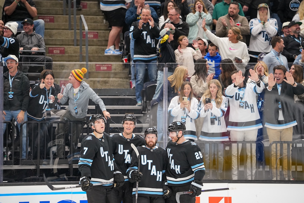 (Chris Samuels | The Salt Lake Tribune) Utah Hockey Club left wing Michael Carcone, second from right, celebrates a goal with teammates versus the Seattle Kraken at the Delta Center in Salt Lake City, Tuesday, April 8, 2025.