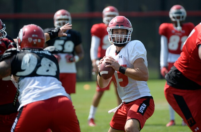 Al Hartmann  |  The Salt Lake Tribune
Quarterback Chase Hansen looks for a receiver down field during practice Monday August 17. 

