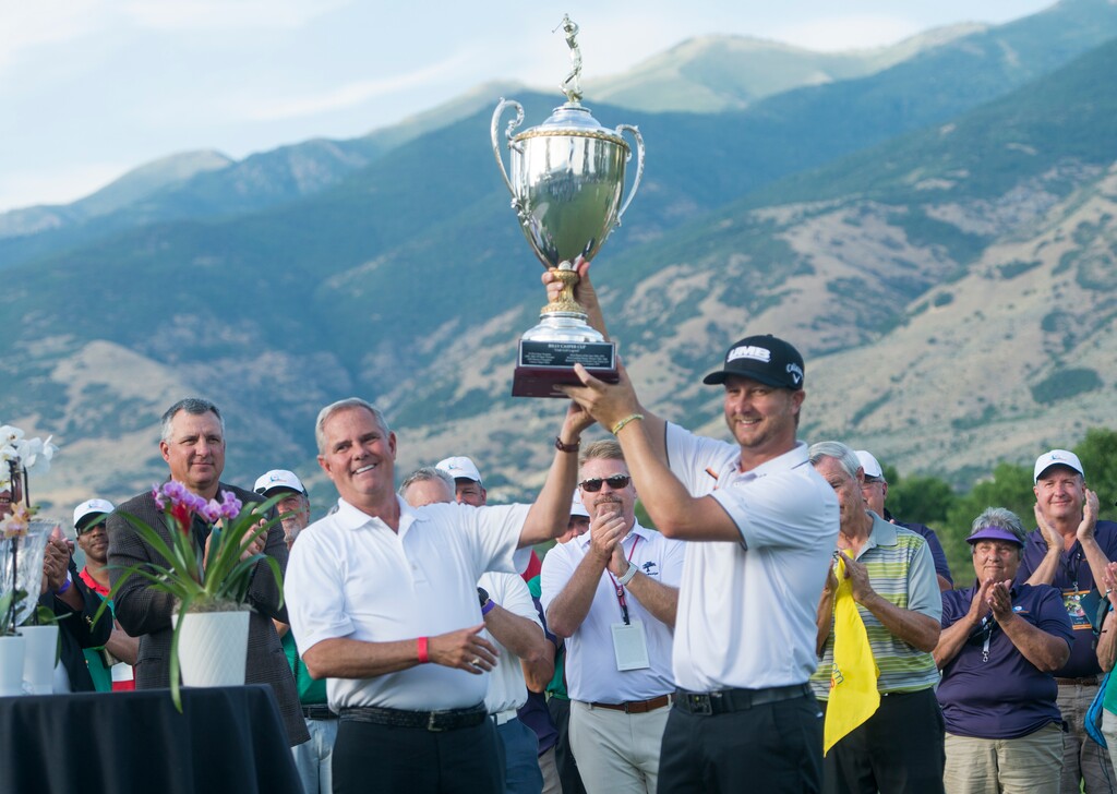 Rick Egan  |  The Salt Lake TribuneBrice Garnett is presented the Billy Casper Cup by David Simmons on the 18th green at Oakridge Country Club in Farmington after he paced first in the Utah Championship Golf Tournament, Sunday, July 16, 2017.