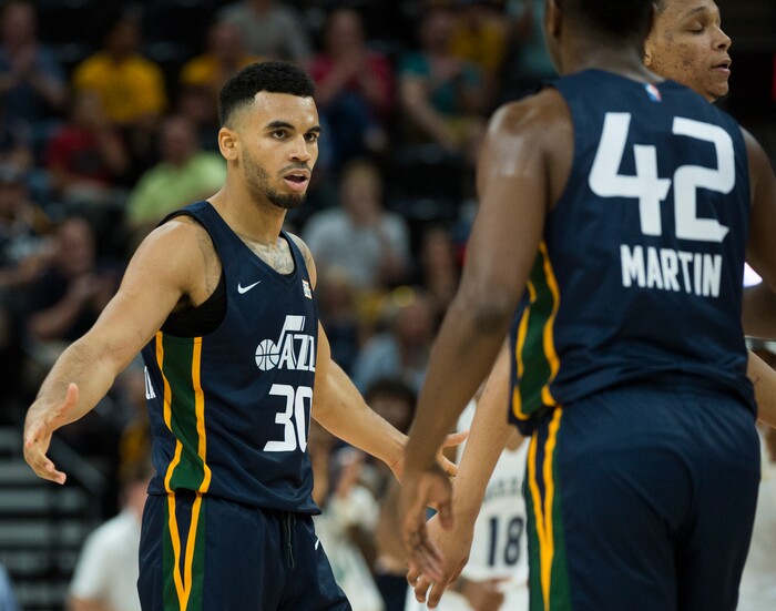 (Rick Egan  |  The Salt Lake Tribune)      Utah Jazz guard Naz Mitrou-Long (30) and Utah Jazz forward Kelan Martin (42) celebrate as the Jazz close the lead to 3, in Utah Jazz summer league action between Utah Jazz and Memphis Grizzlies in Salt Lake City, Tuesday, July 3, 2018.
