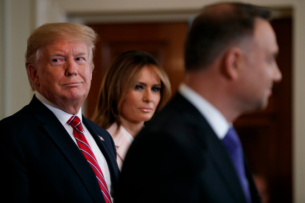 (Jacquelyn Martin | AP Photo) President Donald Trump and first lady Melania Trump attend a Polish-American reception with Polish President Andrzej Duda in the East Room of the White House, Wednesday June 12, 2019.