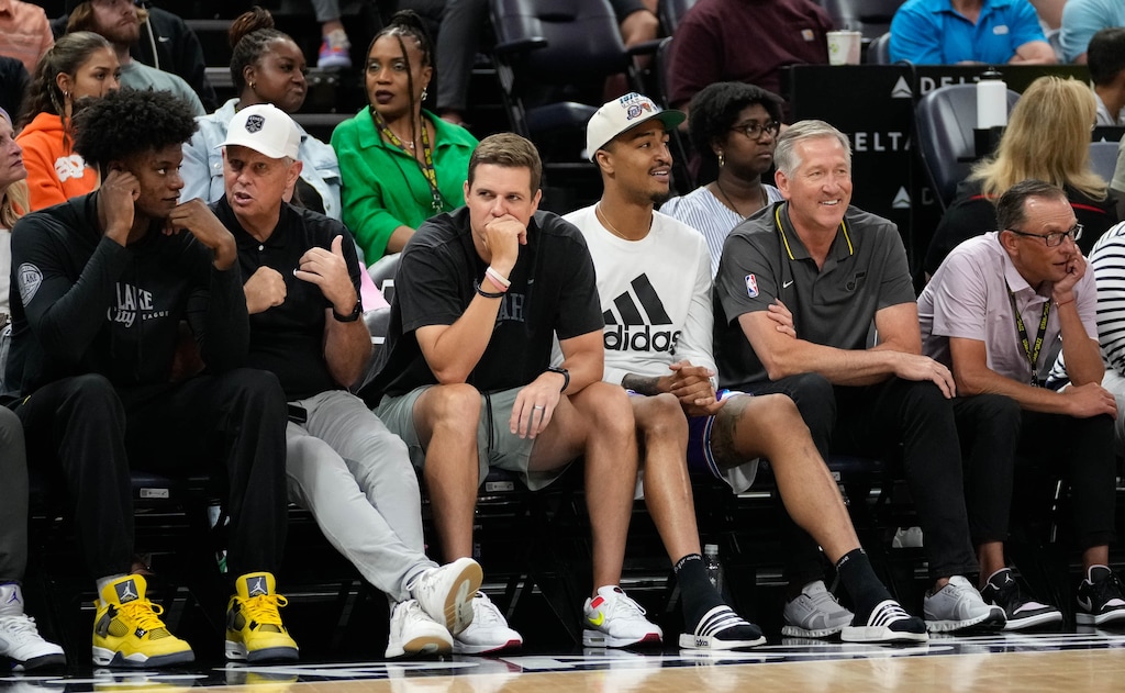 (Francisco Kjolseth | The Salt Lake Tribune) Utah Jazz draft pick Taylor Hendrick speaks with Danny Ainge, CEO of the Utah Jazz, left, alongside coach Will Harding, John Collins, Jeff Hornacek and Jazz General Manager Justin Zanik during an NBA Summer League basketball game Wednesday, July 5, 2023, at the Delta Center in Salt Lake City.
