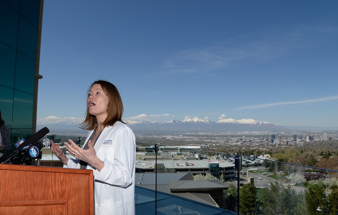 (Francisco Kjolseth  |  The Salt Lake Tribune)  Anne Kirchhoff, PhD, researcher at Huntsman Cancer Institute is framed by the Salt Lake valley on Tuesday, March 23, 2019, as she discusses a study conducted by researchers at HCI that indicates air pollution is a health risk for childhood cancer survivors.