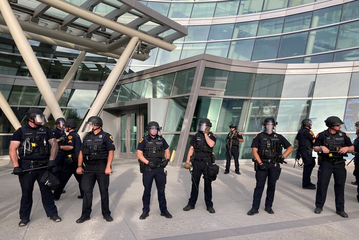 (Trent Nelson  |  The Salt Lake Tribune) Police take position around the Public Safety Building in Salt Lake City as protests against police brutality continue on Monday, June 1, 2020.