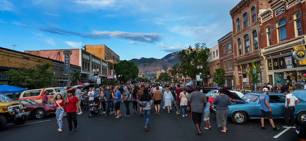 (Leah Hogsten | The Salt Lake Tribune)  Thousands walk Ogden's Historic 25th Street during the open car show on Friday, June 2, 2023.