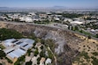 (Francisco Kjolseth | The Salt Lake Tribune) Burnt acreage shows the aftermath of the Canyon Road Fire in Logan that ignited the night before, scorching approximately 17 acres. Investigators say the fire originated in a Utah State University compost pile.