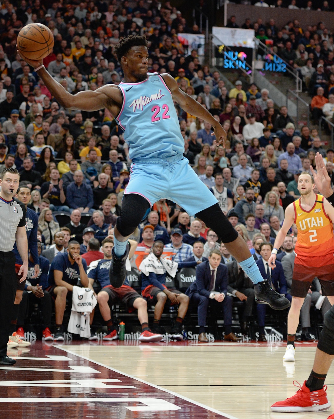 (Francisco Kjolseth  |  The Salt Lake Tribune) Miami Heat forward Jimmy Butler (22) keeps the ball in play as the Utah Jazz host the Miami Heat in their NBA basketball game at Vivint Smart Home Arena in Salt Lake City on Wednesday, Feb. 12, 2020.