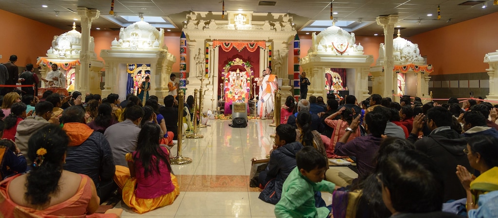 (Bagi Chandrakasan) Priests lead special Diwali prayer services, known as Puja, at the Sri Ganesha Hindu Temple in 2018.