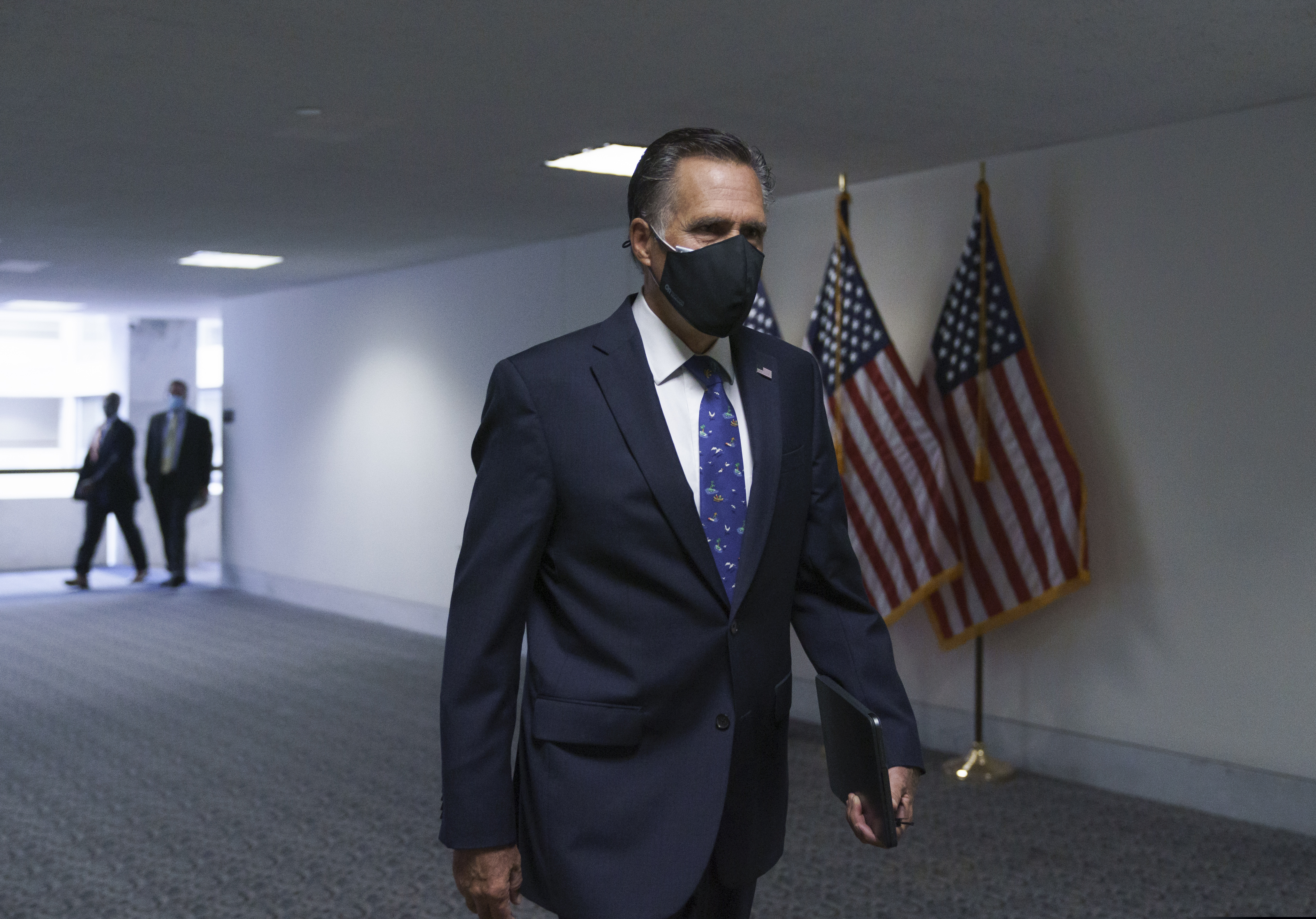 (AP File Photo/J. Scott Applewhite) Sen. Mitt Romney, R-Utah, arrives to join Senate Majority Leader Mitch McConnell, R-Ky., for a closed-door meeting with Senate Republicans, on Capitol Hill in Washington, Friday, Oct. 23, 2020.