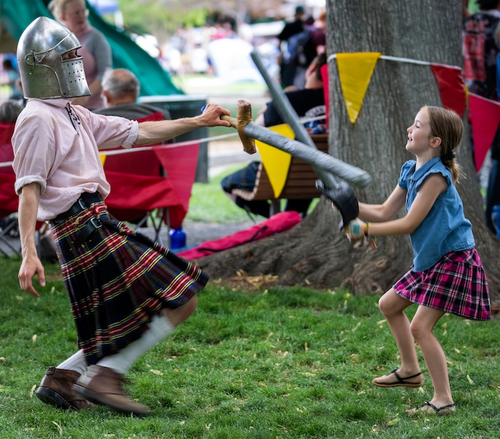 (Rick Egan | The Salt Lake Tribune) Ava Lillywhite, from Draper spars with Logan Millsap, in the Highland games featherweight division at the Payson Scottish Festival, on Saturday, July 9, 2022.
