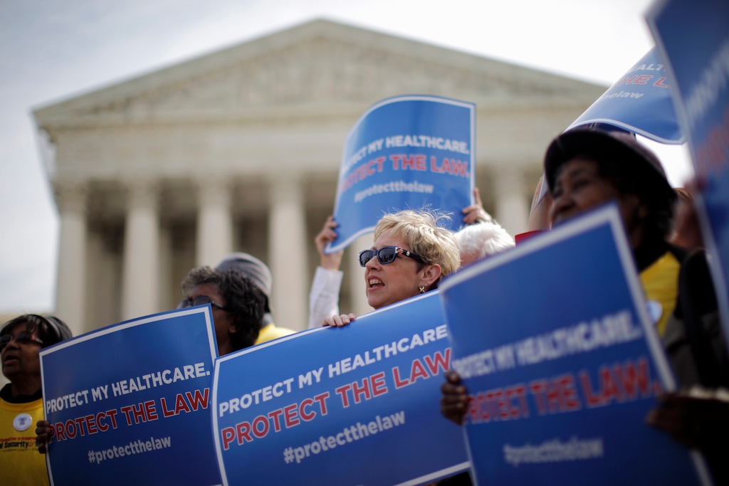 FILE - In this March 28, 2012 file photo, supporters of health care reform rally in front of the Supreme Court in Washington. (AP Photo/Charles Dharapak, File)
