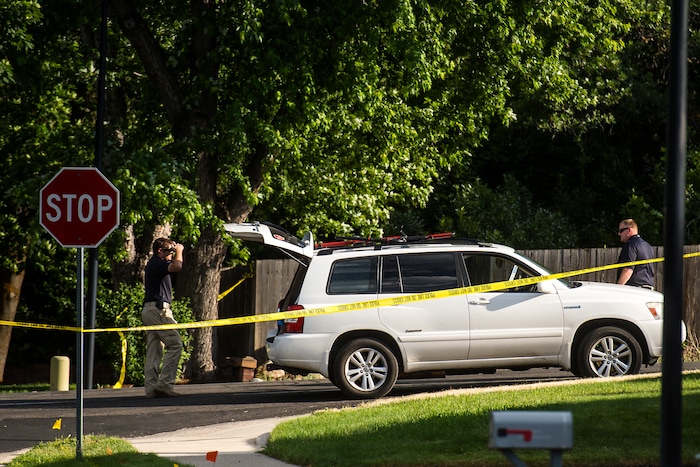Chris Detrick | The Salt Lake Tribune
Police officers investigate the scene of a shooting Tuesday, June 6, 2017. The shooting occurred at about 3:45 p.m. outside of a residence at about 2175 East and Alta Canyon Drive (about 8630 South), said Sandy police Sgt. Jason Nielsen. Nielsen said the shooter was among the dead and, therefore, there is no threat to the public.