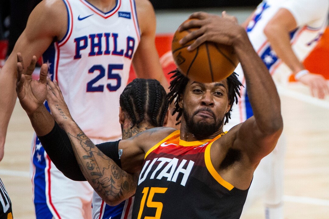 (Rick Egan | The Salt Lake Tribune) Utah center Derrick Favors (15) draws a foul as he grabs a rebound for the Jazz, in NBA action between the Utah Jazz and the Philadelphia 76ers at Vivint Arena, on Monday, Feb. 15, 2021.