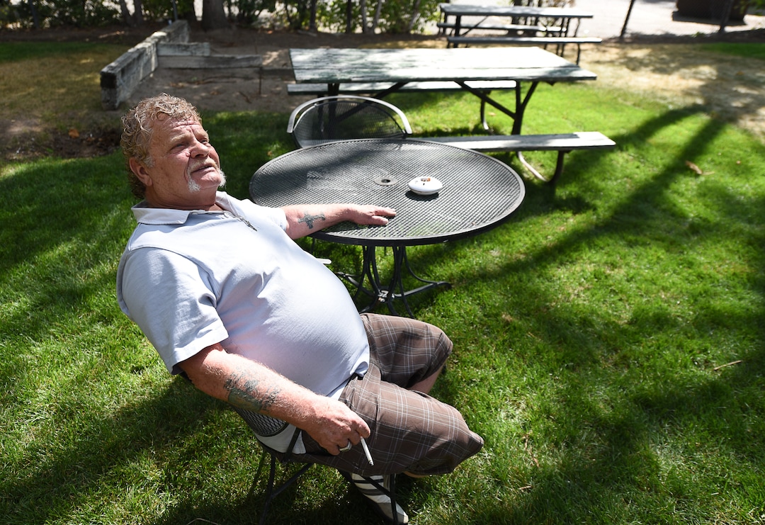 (Francisco Kjolseth  |  The Salt Lake Tribune)  Darwin Osborn, 64, is a Vietnam veteran who was homeless and searched for housing for over a year before landing a one-bedroom apartment in April. He spends time in one of the peaceful corners outside of his apartment recently. Osborn was housed with a VASH voucher and additional barrier removal support through additional funding provided by the state's "100 More Housed" initiative.