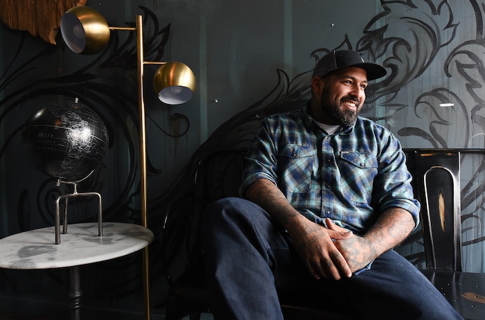 (Francisco Kjolseth  |  The Salt Lake Tribune)  Vincent "Rocco" Vargas a local entrepreneur/actor who's in the cast of the new FX series "Mayans M.C." (which is sort of a continuation of "Sons of Anarchy"), hangs out at his business, Throwbacks Barber Company in Salt Lake City recently as he talks about the arc of his life from a military background to acting. 