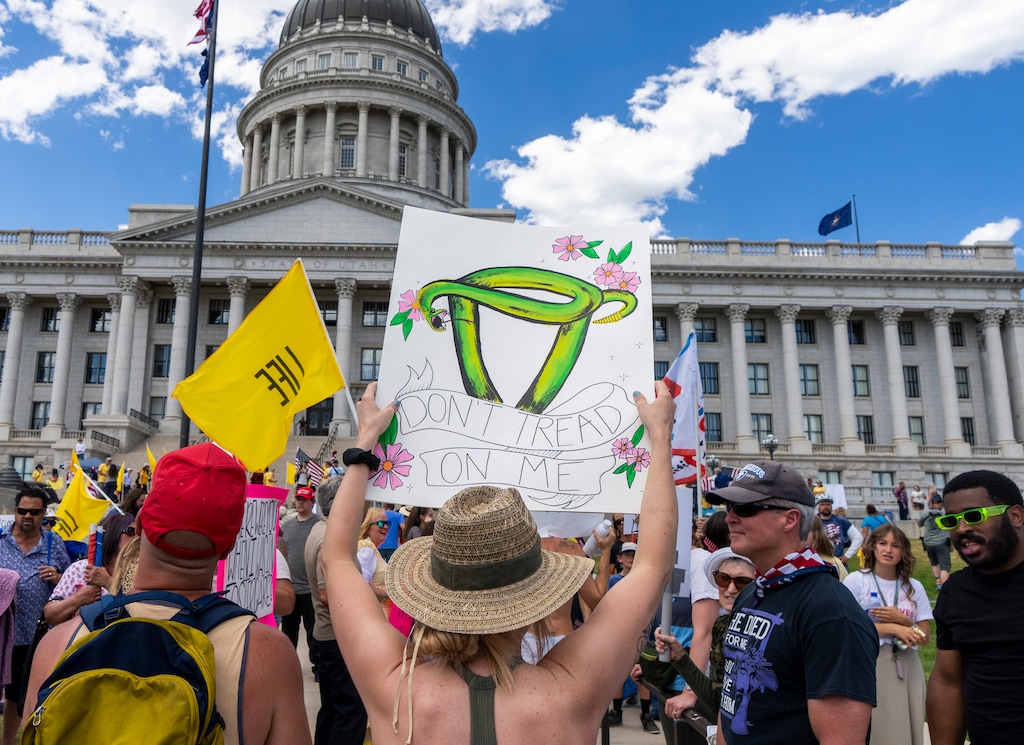 (Rick Egan | The Salt Lake Tribune)  Counterprotesters hold signs as Members of Abortion Free Utah and other groups listen to speakers at the Capitol as they celebrate the end of Roe v. Wade, on Saturday, July 2, 2022.