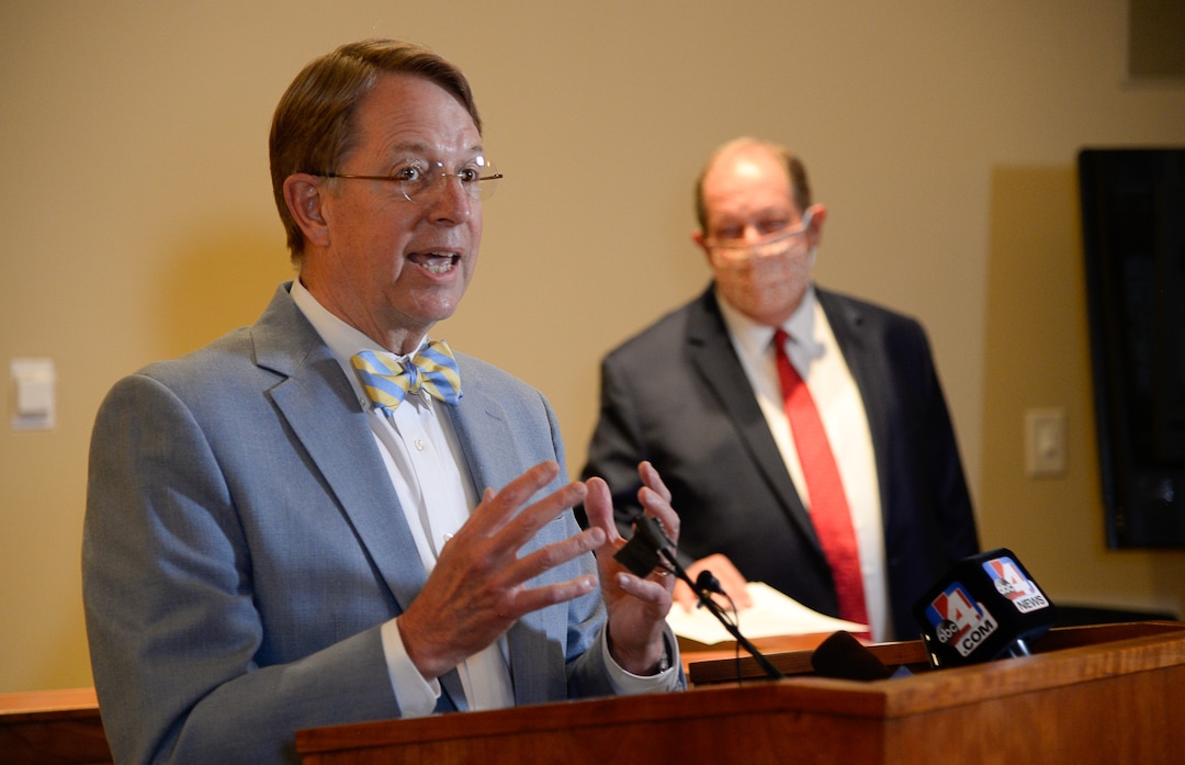 (Francisco Kjolseth  |  The Salt Lake Tribune) Attorneys Jim McConkie, left, and Brad Parker address the media on Monday, May 18, 2020, after their clients Jill and Matt McCluskey (via zoom) joined the press event at the attorney's offices in Murray, regarding newly discovered evidence and recent developments in Lauren McCluskey's case.