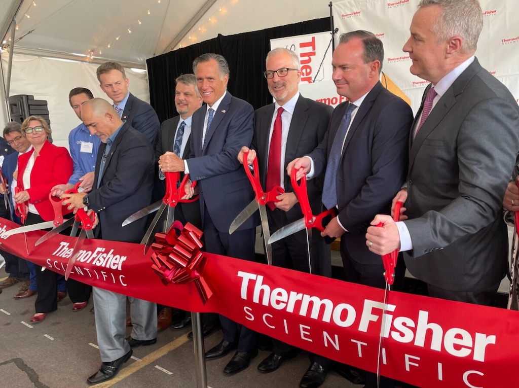 (Tim Vandenack | Standard-Examiner) Numerous leaders assist with a ribbon-cutting ceremony on Wednesday, April 20, 2022, for a new Thermo Fisher Scientific facility in Ogden. Pictured, from left, are Utah Sen. John Johnson, Ogden City Council members Angela Choberka and Ken Richey, U.S. Rep. Blake Moore, Ogden City Councilperson Luis Lopez, Thermo Fisher executive Chad Dale, U.S. Sen. Mitt Romney, Thermo Fisher executive Paul Parker, U.S. Sen. Mike Lee and Thermo Fisher executive Mitch Kennedy.