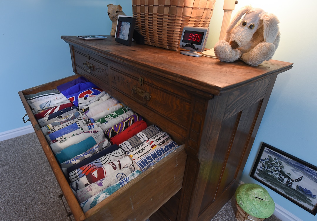 (Francisco Kjolseth  |  The Salt Lake Tribune)  Blair Tomten, who has been using the Kondo method to tidy up her home in Millcreek, started implementing the process four years ago after being inspired by the minimalism approach to tackling your stuff category by category as opposed to room by room. Muttly, one of the few childhood stuffed toys to have survived the purge, keeps watch over the drawer with the T-shirt collection that she couldn't part with.  