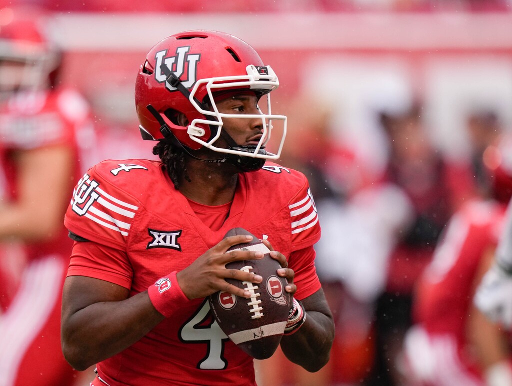 (Francisco Kjolseth | The Salt Lake Tribune) Utah Utes quarterback Devon Dampier (4) looks for an opening in Cal Poly's defense earlier this season.