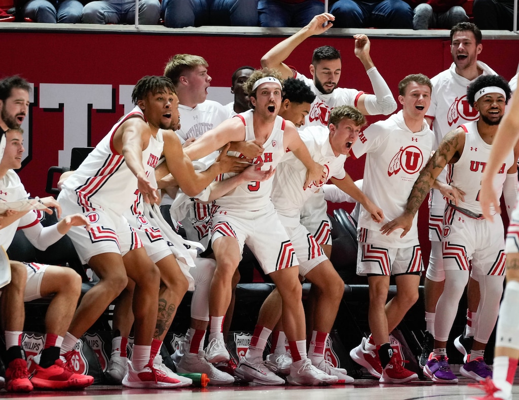 (Francisco Kjolseth | The Salt Lake Tribune) The Utah bench erupts as the University of Utah hosts the Arizona Wildcats in NCAA basketball in Salt Lake City on Thursday, Dec. 1, 2022.