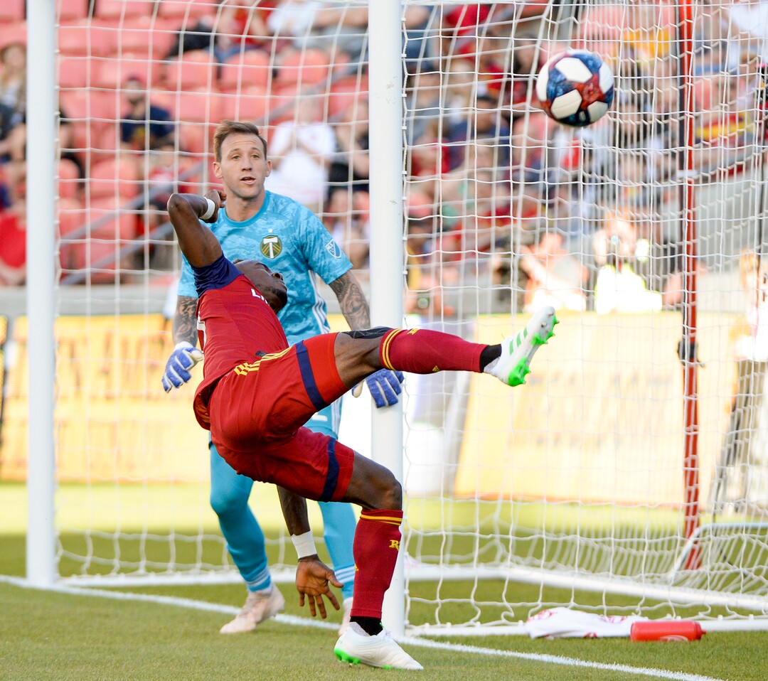 Leah Hogsten  |  The Salt Lake Tribune  Real Salt Lake forward Sam Johnson (50) misses a foot on the ball in front of Portland Timbers goalkeeper Steve Clark (12). Real Salt Lake hosts the Portland Timbers, Saturday, May 4, 2019 at Rio Tinto Stadium in Salt Lake City.