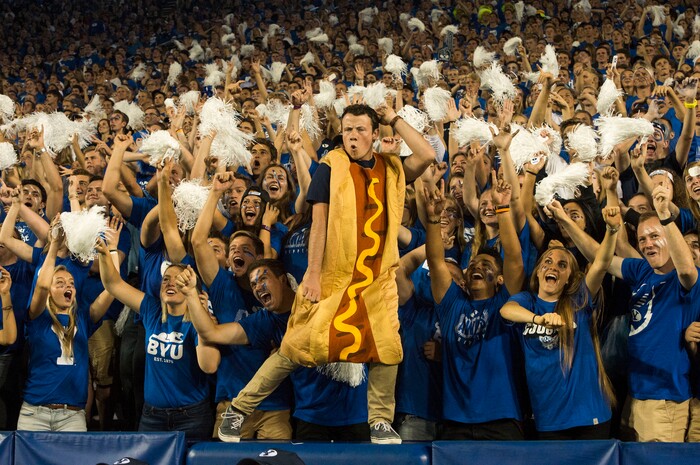 (Rick Egan  |  The Salt Lake Tribune) Cougar fans didn't have a lot to cheer about in the first half, but that didn't stop them from cheering on Adam Smith as he danced in a hotdog suit during a break in the action at Lavell Edwards Stadium in Provo, Saturday, September 9, 2017.
