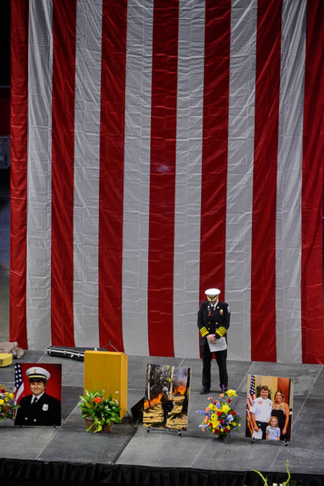 (Trent Nelson | The Salt Lake Tribune)  Funeral services for Battalion Chief Matthew Burchett at the Maverik Center in West Valley City, Monday Aug. 20, 2018.