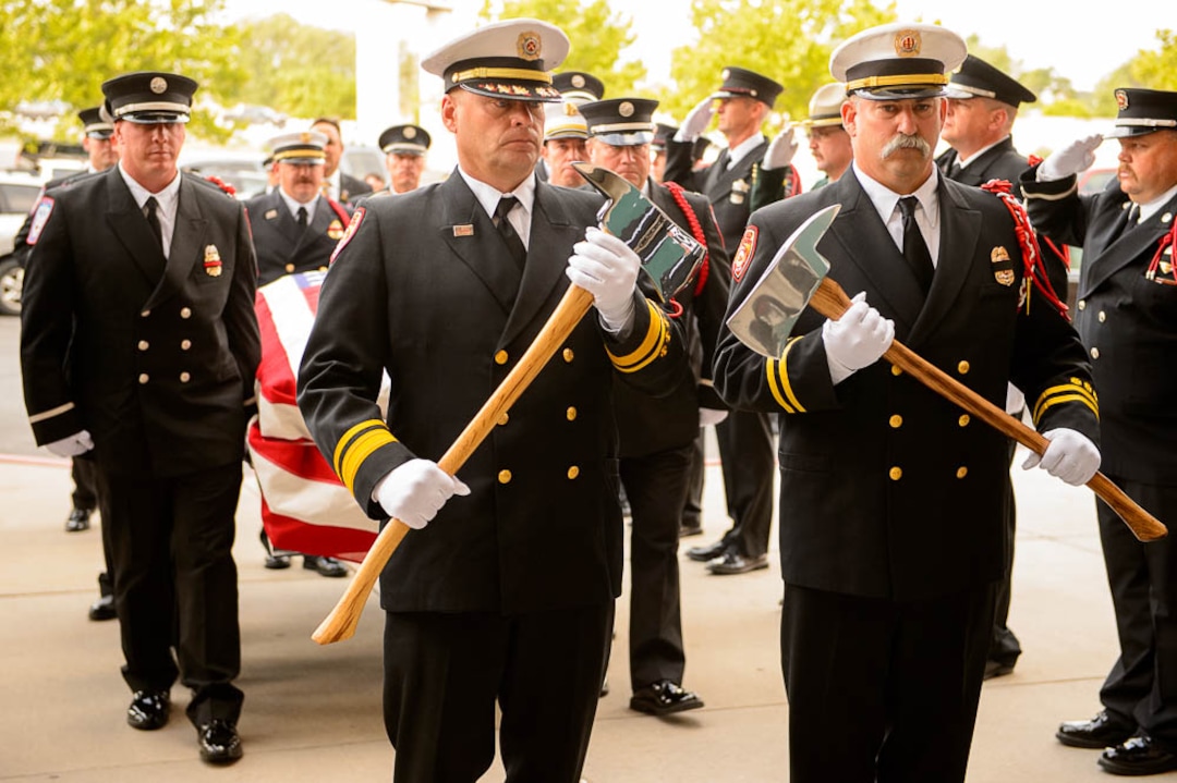 (Trent Nelson | The Salt Lake Tribune)  Honor Guard at the funeral services for Battalion Chief Matthew Burchett at the Maverik Center in West Valley City, Monday Aug. 20, 2018.