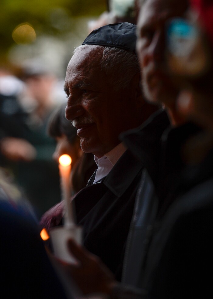 Leah Hogsten | The Salt Lake Tribune Candles are lit outside Chabad Lubavitch of Utah as members of Utah's Jewish and interfaith communities held a vigil and prayer service for the 11 people killed at the Tree of Life Synagogue in Pittsburgh, Monday, Oct. 29, 2018.